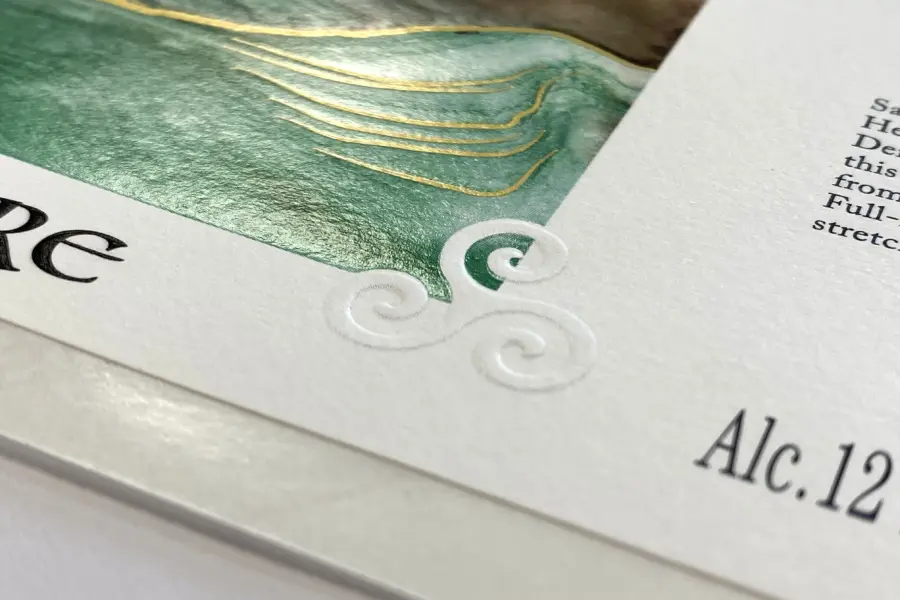 Embossed Label Swirl
